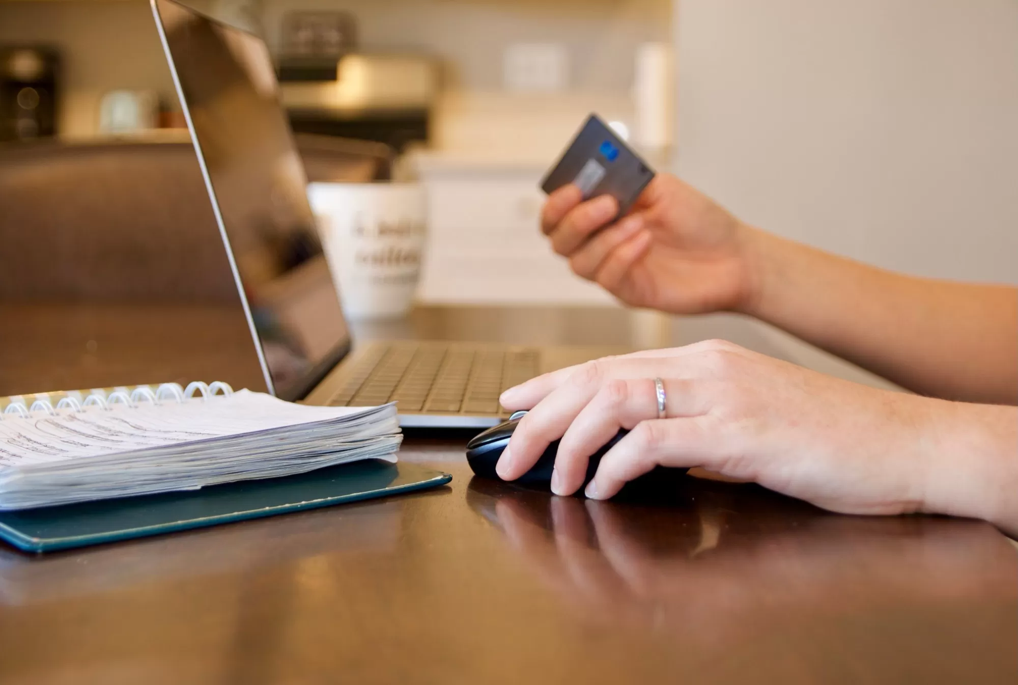 A laptop open to account statements, the paperless way to bank